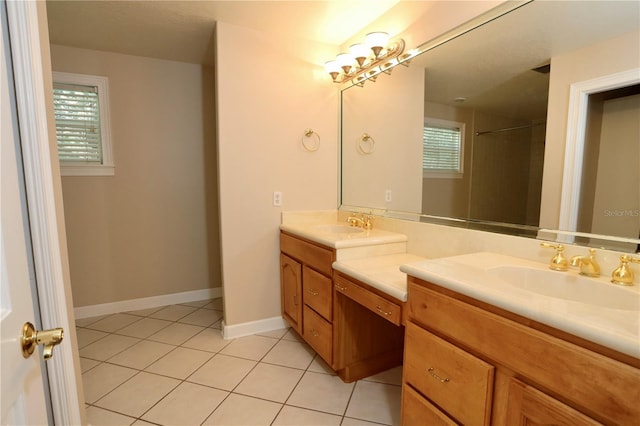 1843 Harbor Blvd, Kissimmee, FL 34744 - full bath featuring double vanity, tile patterned flooring, plenty of natural light, and a shower