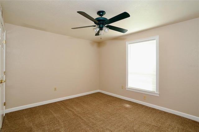 1843 Harbor Blvd, Kissimmee, FL 34744 - carpeted spare room featuring baseboards and ceiling fan