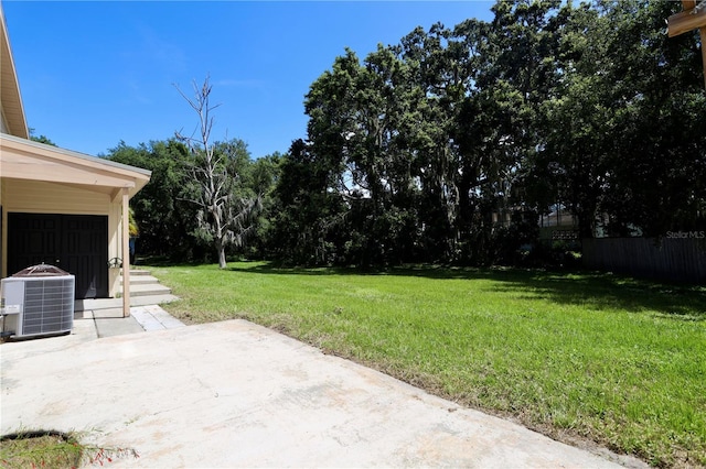 1843 Harbor Blvd, Kissimmee, FL 34744 - view of yard featuring a patio area