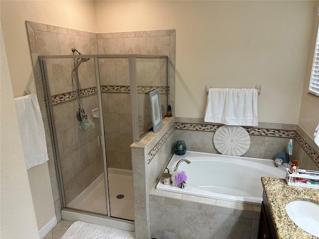 2016 Lakeside Ave, Davenport, FL 33837 - full bath featuring a bath, a stall shower, and vanity
