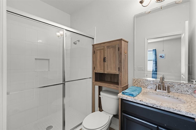 1951 Partin Terrace Rd, Kissimmee, FL 34744 - bathroom featuring toilet, vanity, and a stall shower