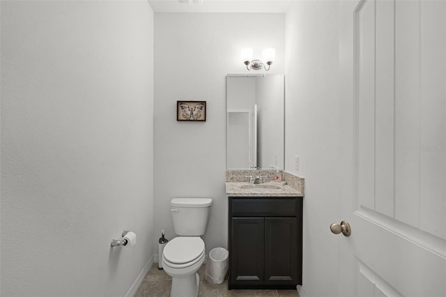 1951 Partin Terrace Rd, Kissimmee, FL 34744 - bathroom with vanity, toilet, baseboards, and tile patterned floors