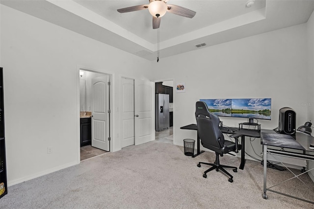 1951 Partin Terrace Rd, Kissimmee, FL 34744 - office space with a raised ceiling, carpet floors, a ceiling fan, and baseboards