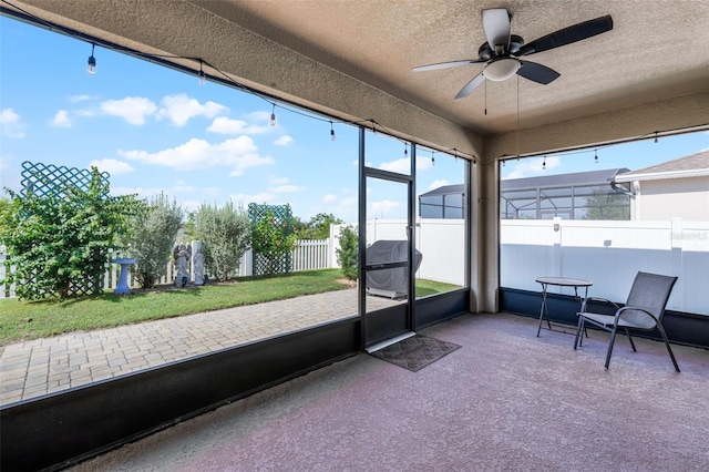1951 Partin Terrace Rd, Kissimmee, FL 34744 - sunroom featuring a ceiling fan and plenty of natural light