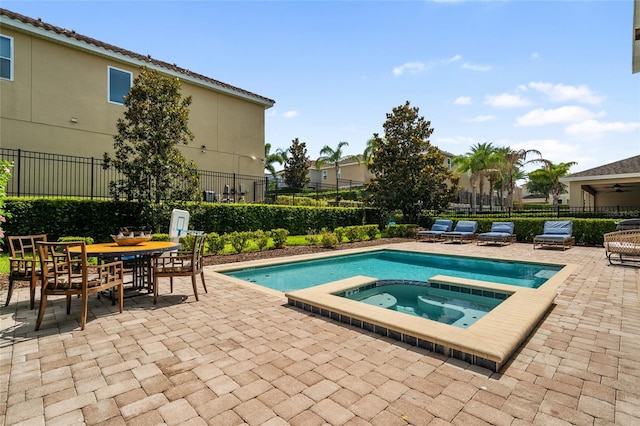 7616 Brookhurst Ln, Kissimmee, FL 34747 - view of pool featuring a patio area and a pool with connected hot tub