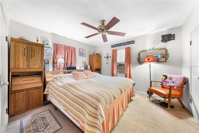 517 Carolina Ave, Saint Cloud, FL 34769 - bedroom with light carpet, a ceiling fan, and baseboards