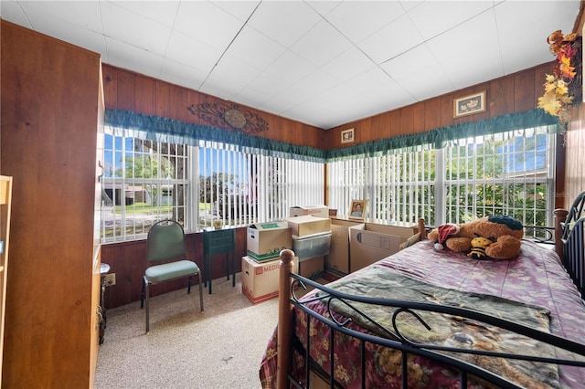 517 Carolina Ave, Saint Cloud, FL 34769 - bedroom featuring wooden walls and carpet