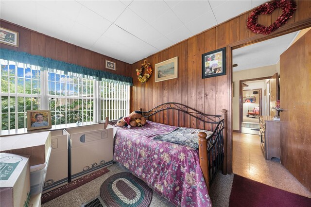 517 Carolina Ave, Saint Cloud, FL 34769 - bedroom featuring wooden walls