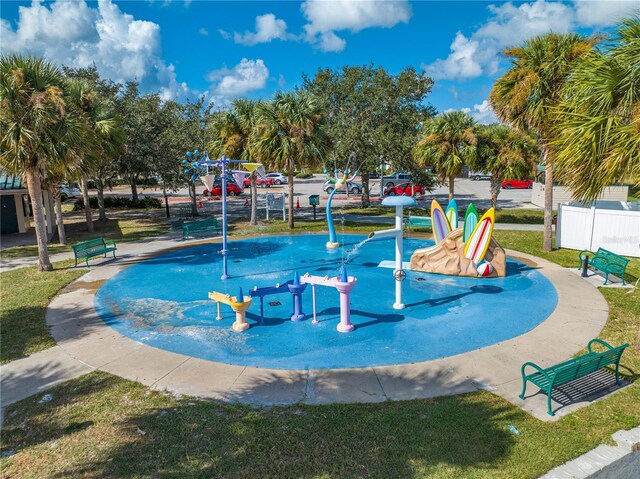 517 Carolina Ave, Saint Cloud, FL 34769 - view of swimming pool featuring a water play area and a yard
