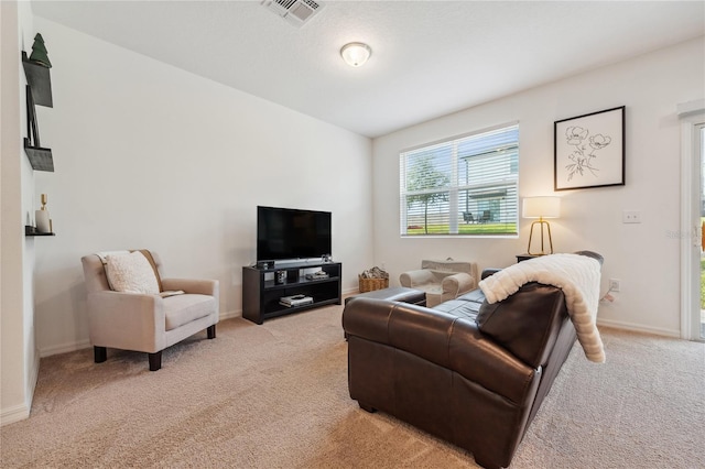 955 Grandin St, Davenport, FL 33837 - living area featuring light carpet and baseboards