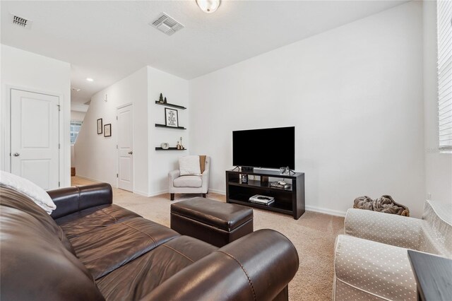 955 Grandin St, Davenport, FL 33837 - living room with light colored carpet and baseboards