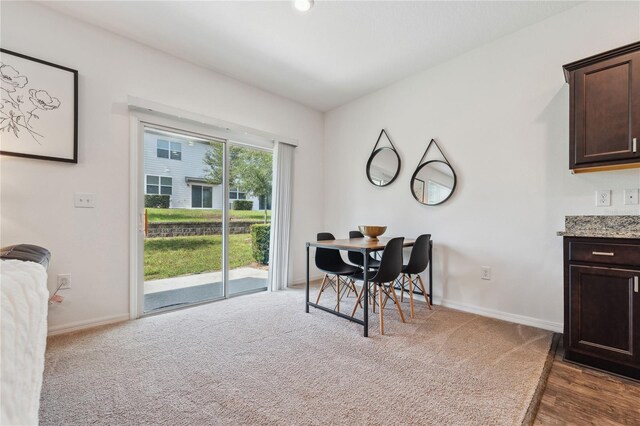 955 Grandin St, Davenport, FL 33837 - dining space featuring baseboards and carpet flooring