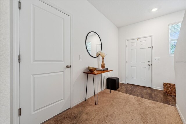 955 Grandin St, Davenport, FL 33837 - foyer featuring carpet floors, baseboards, and recessed lighting