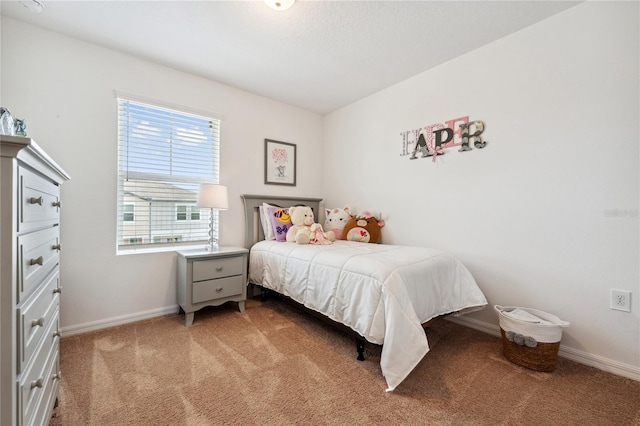 955 Grandin St, Davenport, FL 33837 - bedroom with carpet floors and baseboards