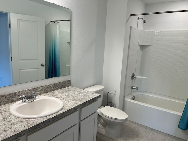 254 Mandovi St, Davenport, FL 33837 - full bathroom featuring vanity, shower / bath combo with shower curtain, toilet, and tile patterned floors