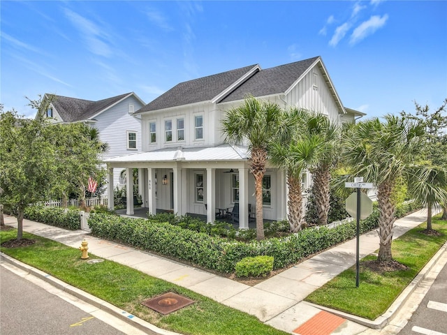 960 Civitas Way, Winter Garden, FL 34787 - modern inspired farmhouse with board and batten siding, covered porch, and roof with shingles
