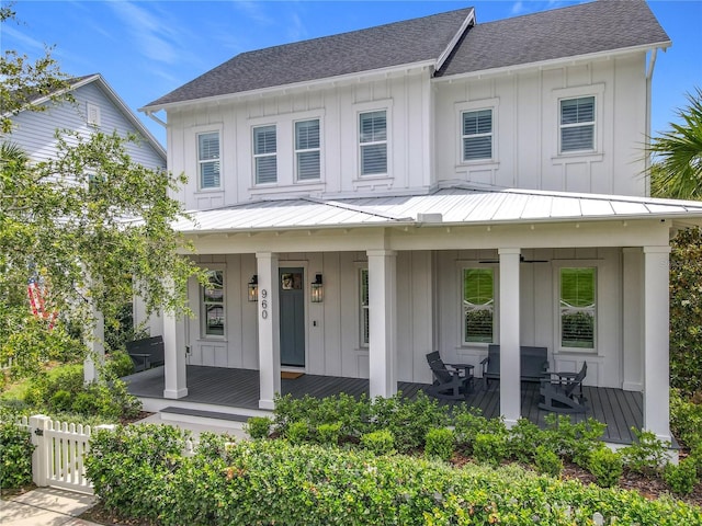 960 Civitas Way, Winter Garden, FL 34787 - view of front of home featuring covered porch, board and batten siding, roof with shingles, and a standing seam roof