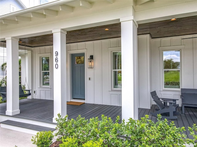 960 Civitas Way, Winter Garden, FL 34787 - view of exterior entry with board and batten siding and a porch