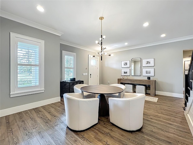 960 Civitas Way, Winter Garden, FL 34787 - dining space with ornamental molding, a chandelier, baseboards, wood finished floors, and recessed lighting