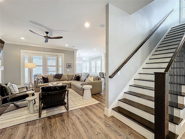 960 Civitas Way, Winter Garden, FL 34787 - living area with a ceiling fan, stairs, wood finished floors, crown molding, and recessed lighting