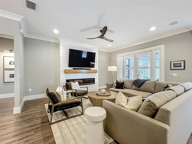 960 Civitas Way, Winter Garden, FL 34787 - living area with crown molding, a ceiling fan, wood finished floors, baseboards, and recessed lighting