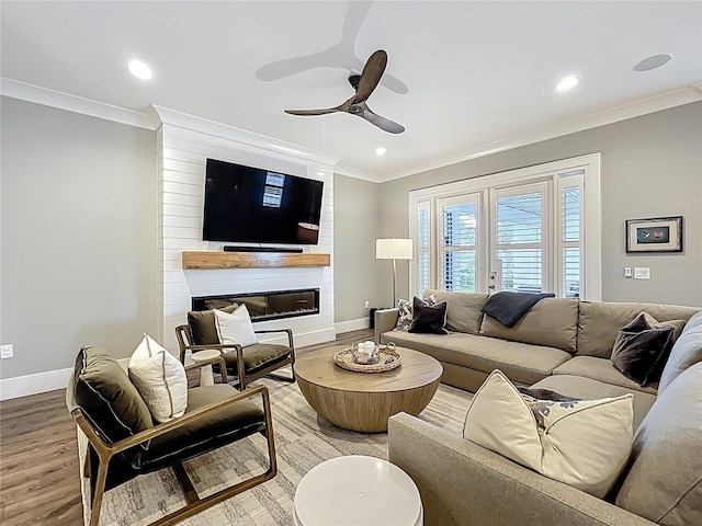 960 Civitas Way, Winter Garden, FL 34787 - living area with ornamental molding, wood finished floors, a ceiling fan, baseboards, and recessed lighting