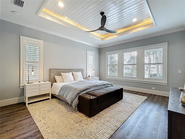 960 Civitas Way, Winter Garden, FL 34787 - bedroom featuring a raised ceiling, dark wood-type flooring, baseboards, ornamental molding, and ceiling fan