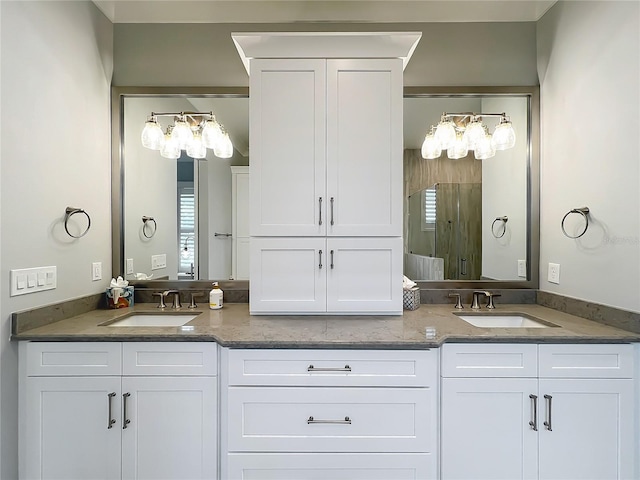 960 Civitas Way, Winter Garden, FL 34787 - bathroom with double vanity, a stall shower, and healthy amount of natural light