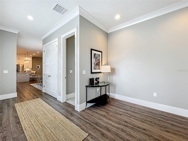 960 Civitas Way, Winter Garden, FL 34787 - hallway featuring ornamental molding, dark wood-type flooring, baseboards, and recessed lighting