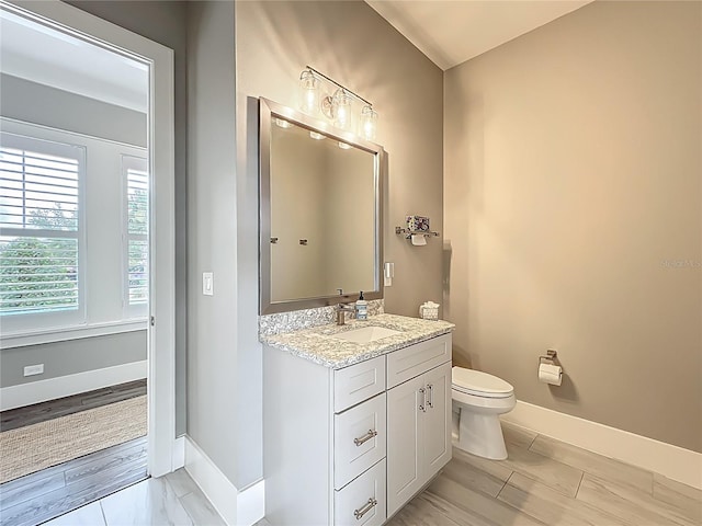 960 Civitas Way, Winter Garden, FL 34787 - bathroom featuring baseboards, toilet, and vanity