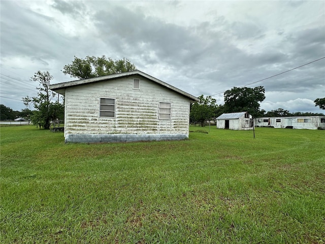 1886 Pleasant Hill Rd, Kissimmee, FL 34746 - view of side of property featuring a yard