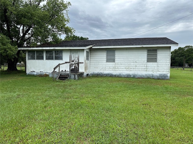 1886 Pleasant Hill Rd, Kissimmee, FL 34746 - back of property featuring a yard