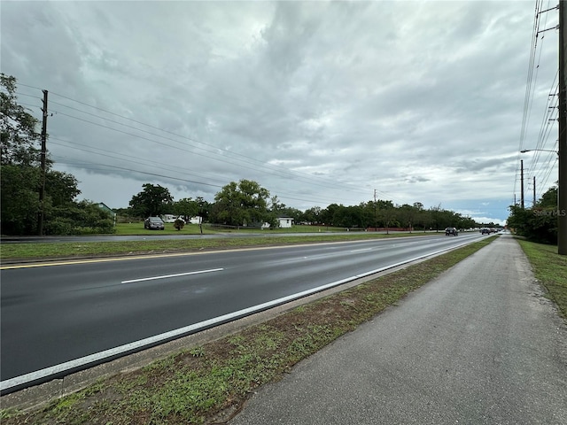 1886 Pleasant Hill Rd, Kissimmee, FL 34746 - view of asphalt street featuring street lighting