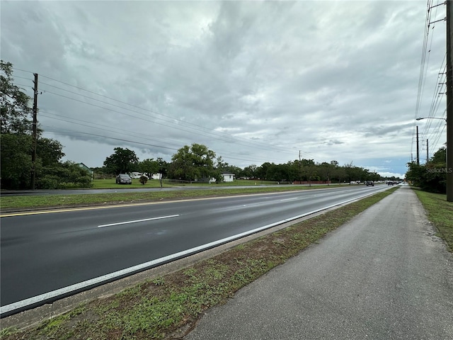 1886 Pleasant Hill Rd, Kissimmee, FL 34746 - view of asphalt street featuring street lighting