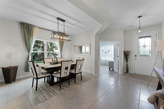 3420 Middlebrook Pl, Harmony, FL 34773 - dining room featuring plenty of natural light and light tile patterned flooring