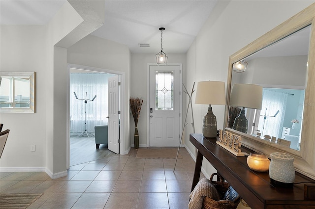 3420 Middlebrook Pl, Harmony, FL 34773 - entryway featuring light tile patterned flooring
