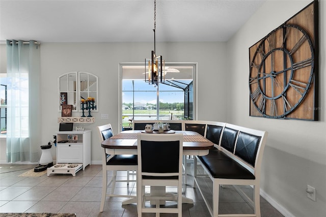 3420 Middlebrook Pl, Harmony, FL 34773 - dining room featuring tile patterned floors and a chandelier