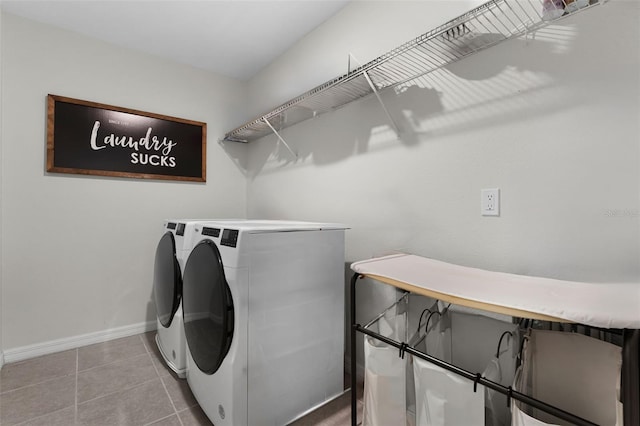 3420 Middlebrook Pl, Harmony, FL 34773 - laundry room with washing machine and dryer and tile patterned flooring