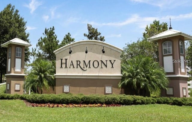 3420 Middlebrook Pl, Harmony, FL 34773 - community sign with a yard