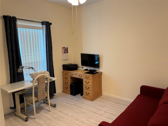 3476 Yarian Dr, Haines City, FL 33844 - office with light wood-type flooring, baseboards, and a ceiling fan