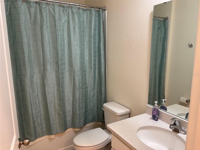 3476 Yarian Dr, Haines City, FL 33844 - bathroom with toilet, vanity, and shower / bath combo