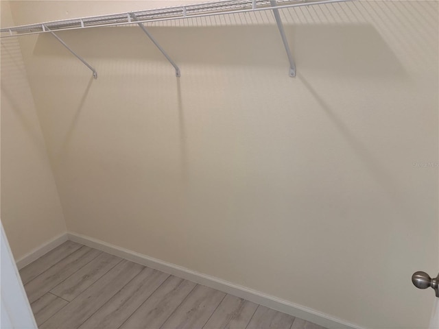 3476 Yarian Dr, Haines City, FL 33844 - spacious closet featuring light wood-type flooring