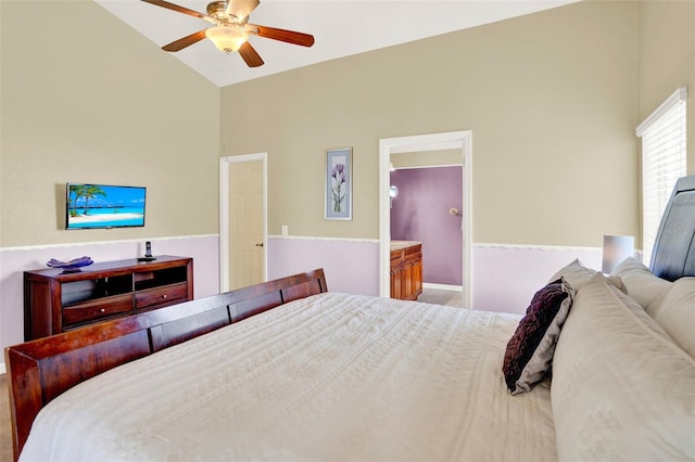 737 Oxford Dr, Davenport, FL 33897 - bedroom with high vaulted ceiling, ensuite bath, and a ceiling fan