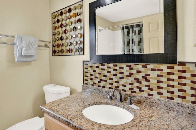 737 Oxford Dr, Davenport, FL 33897 - bathroom featuring toilet, vanity, and a shower