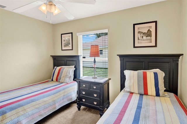 737 Oxford Dr, Davenport, FL 33897 - carpeted bedroom featuring ceiling fan