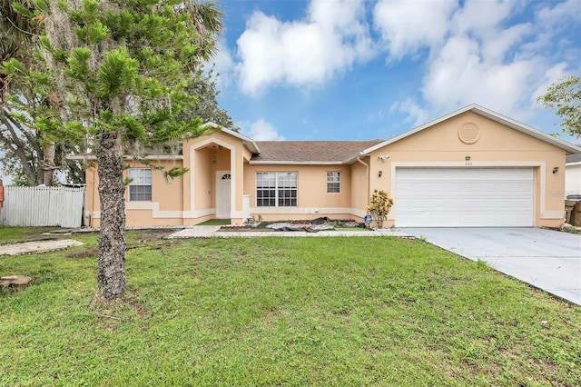 600 Regency Way, Kissimmee, FL 34758 - single story home featuring stucco siding, concrete driveway, and an attached garage