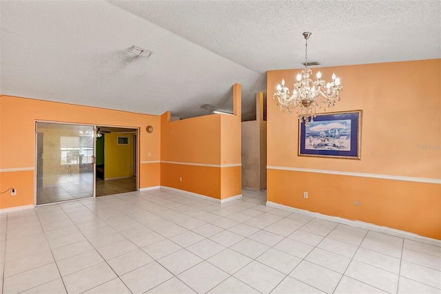 600 Regency Way, Kissimmee, FL 34758 - unfurnished room featuring a textured ceiling, a chandelier, lofted ceiling, and light tile patterned floors