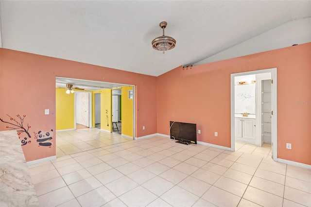 600 Regency Way, Kissimmee, FL 34758 - empty room with lofted ceiling, light tile patterned floors, and ceiling fan