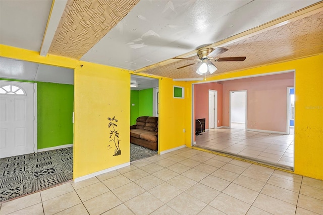 600 Regency Way, Kissimmee, FL 34758 - tiled spare room featuring a ceiling fan and baseboards