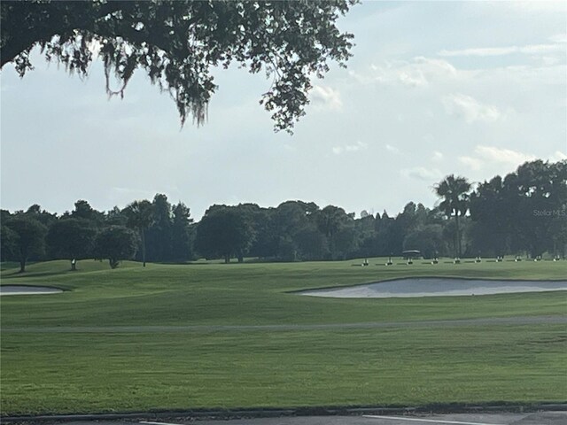 416 Howard Ave Unit D, Lakeland, FL 33815 - view of home's community with golf course view and a yard